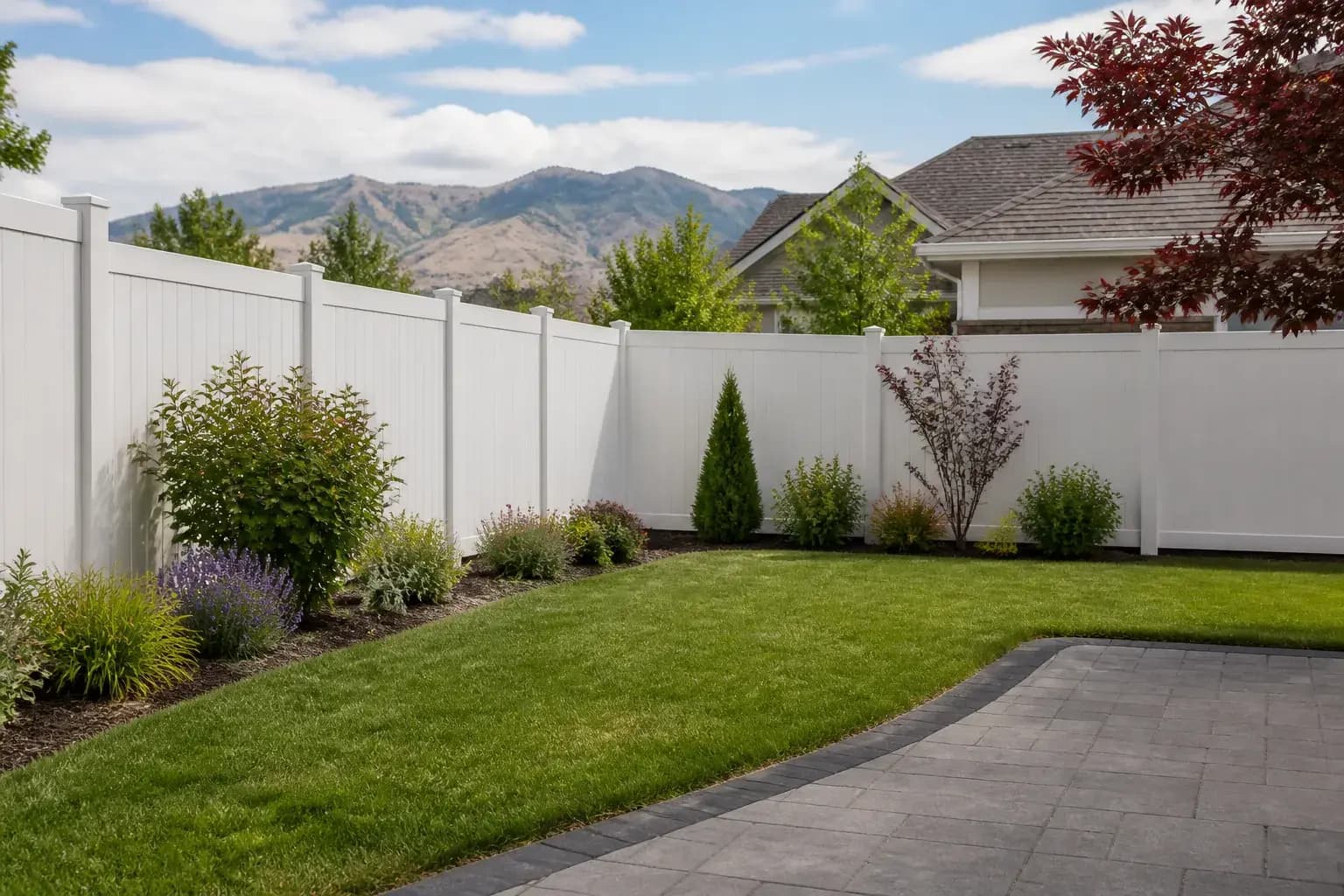 Completed vinyl fence around a tidy Boise suburban yard